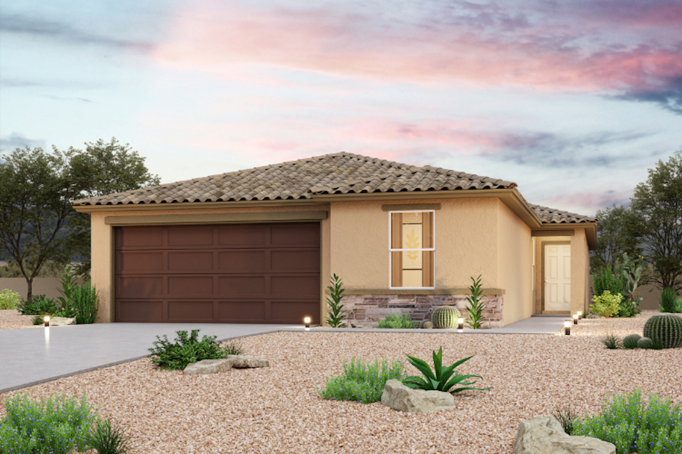 A house with a gravel driveway.