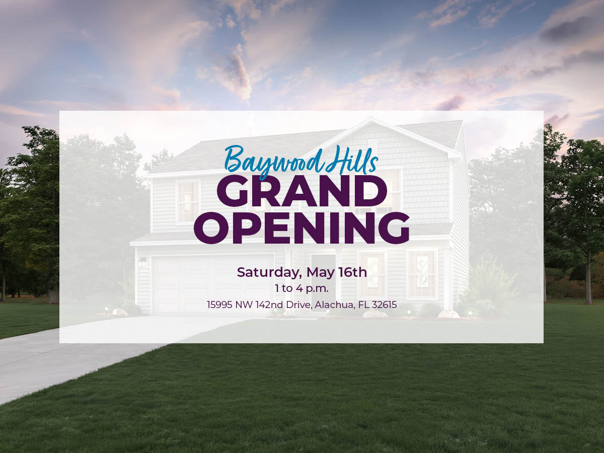 A white building with a sign on it.