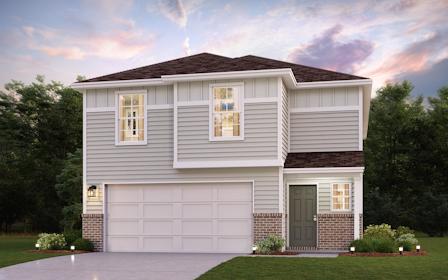 A white house with a garage.