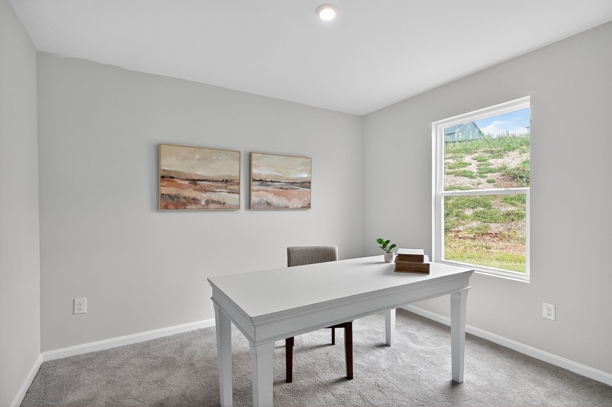 A white table in a room.