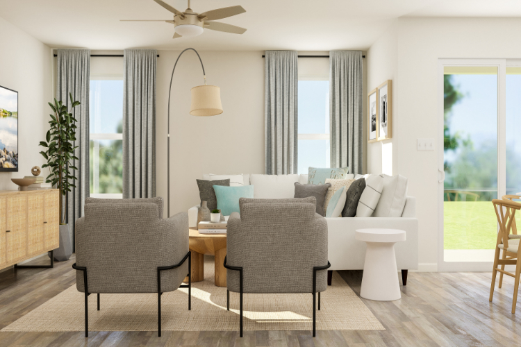 A living room with a couch and chairs.